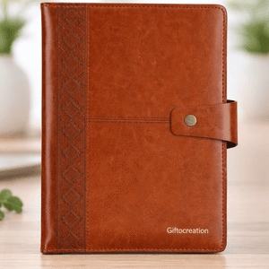 Premium brown leather diary with button closure and textured design, ideal for gifting