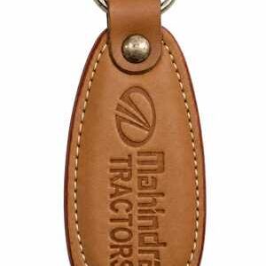 Mahindra leather keychain with embossed logo for corporate gifting and promotional use